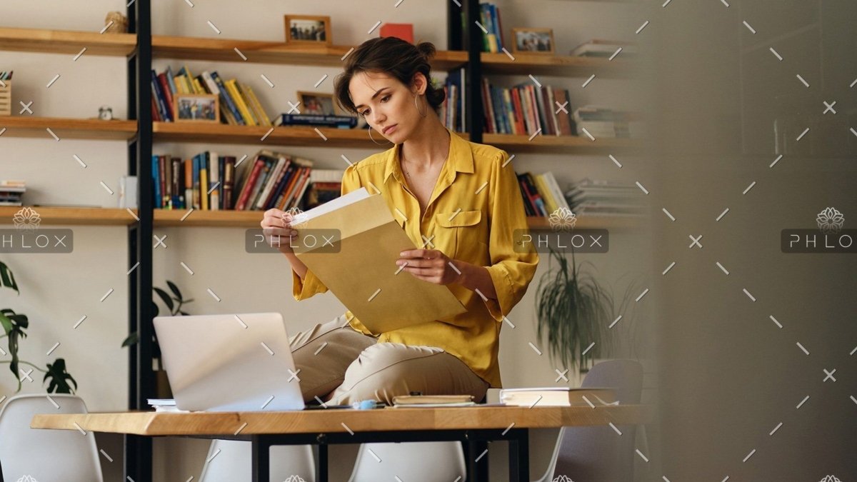 demo attachment 468 beautiful woman in shirt sitting on desk with le96bag