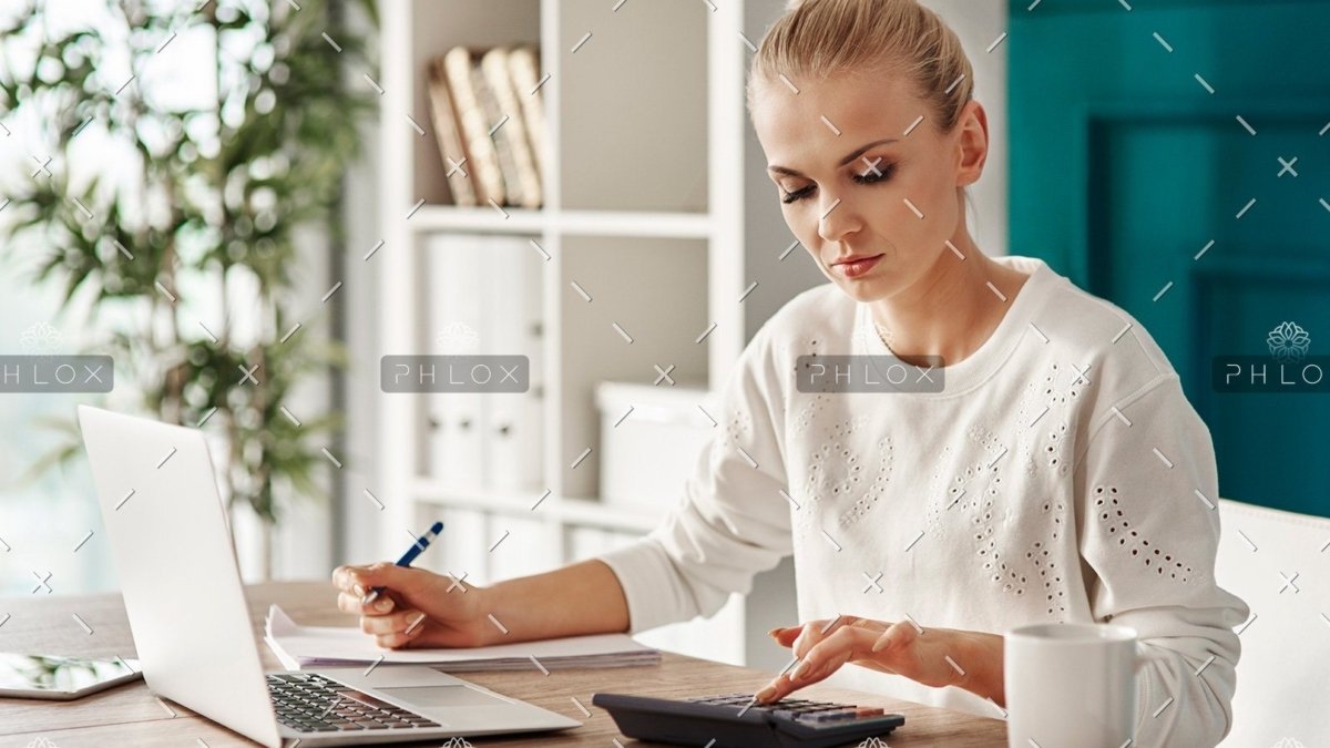 demo attachment 469 concentrated woman budgeting at office rvs7tep